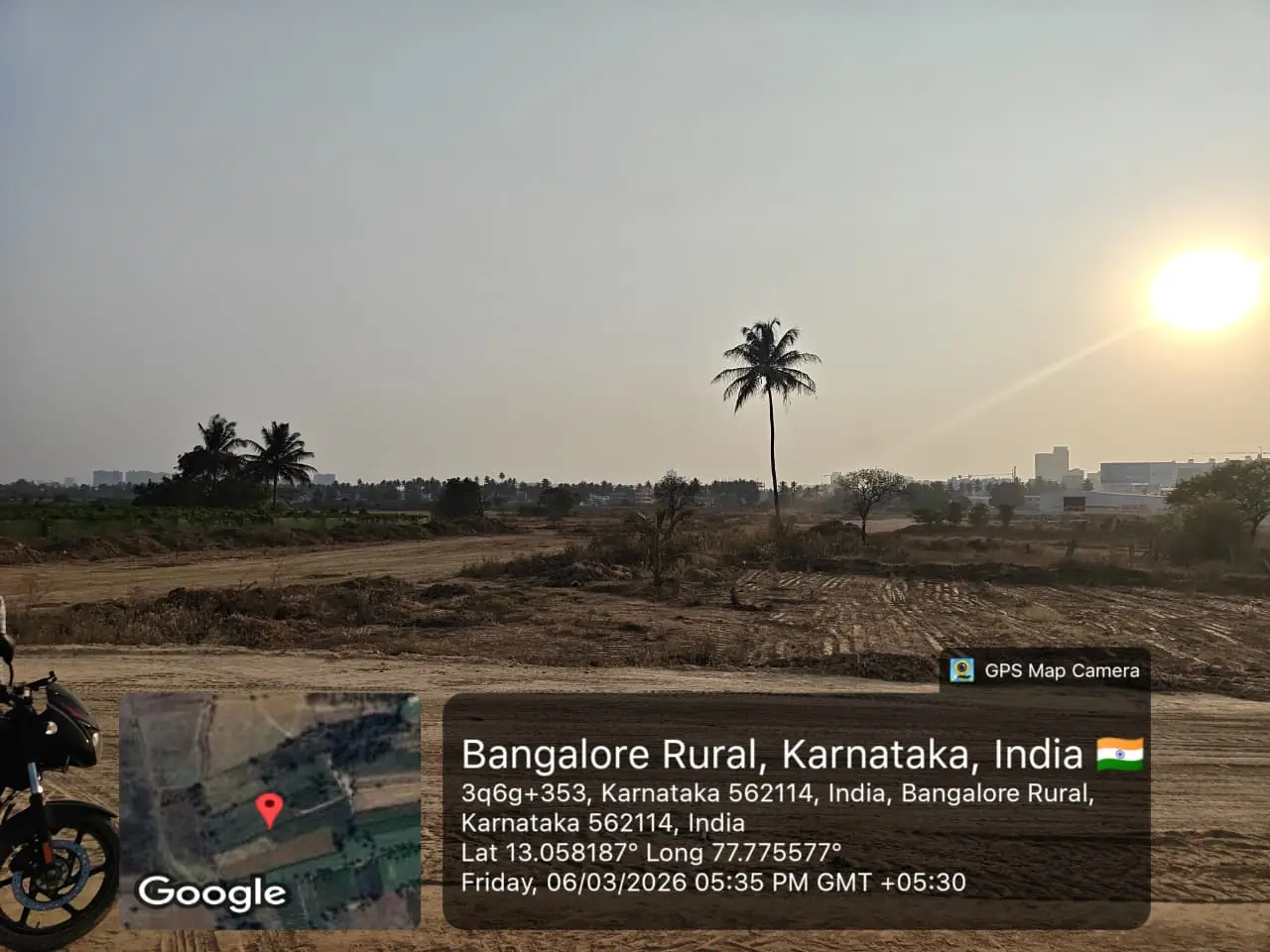 Featured Image of Sobha One Residences Site Progress March 2026 - Cleared site with palm tree centrepiece at sunset, GPS-stamped Amanidoddakere Village