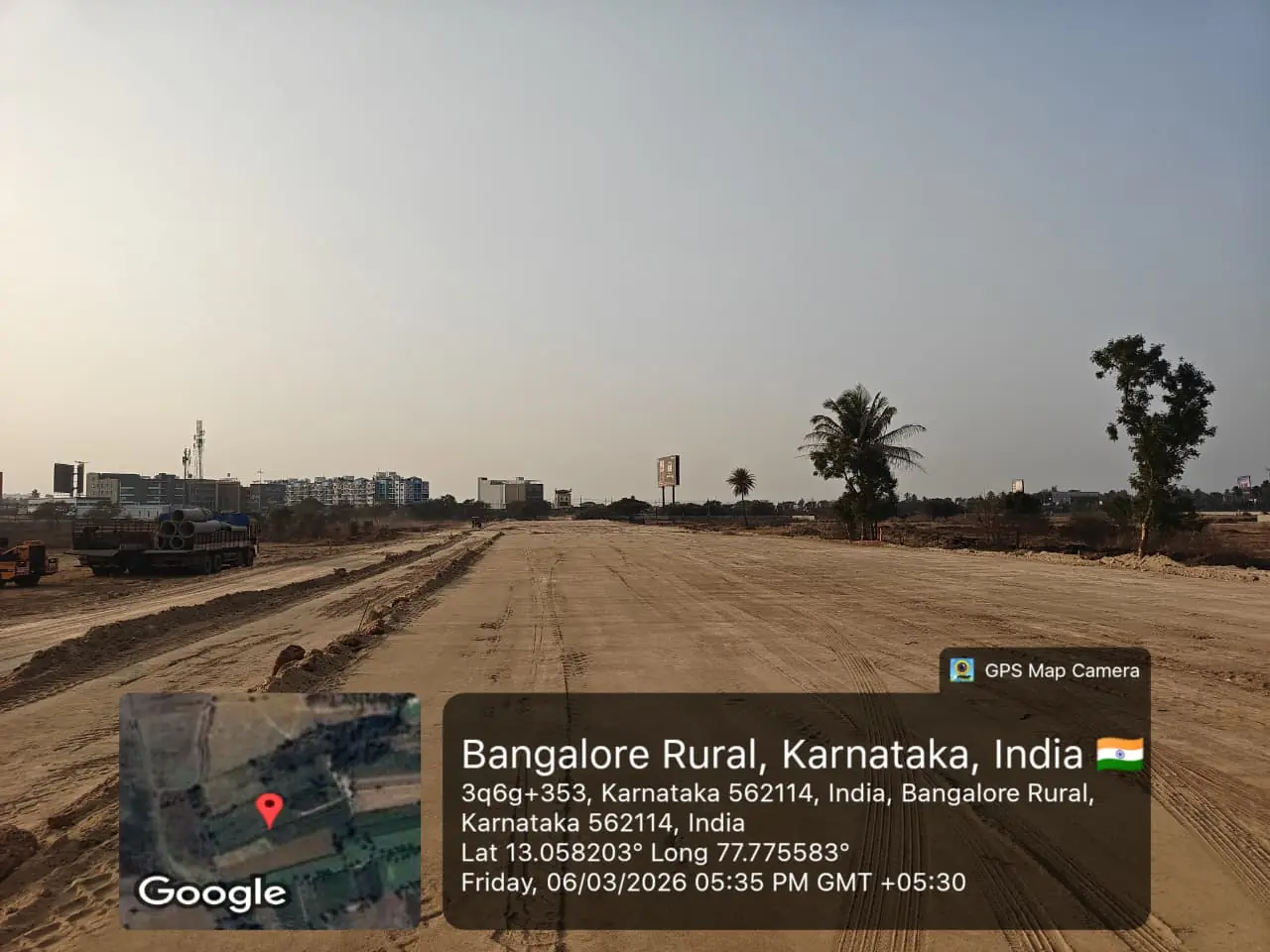 Featured Image of Sobha One Residences Site Progress March 2026 - Compacted internal access road with infrastructure trucks, GPS-stamped Amanidoddakere Village